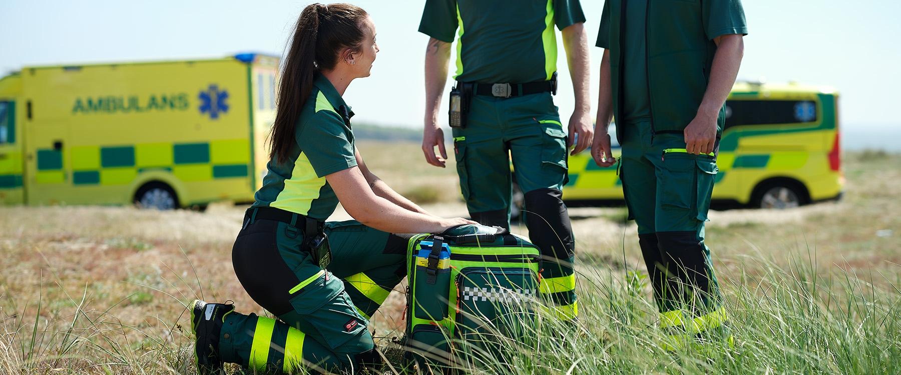 Emergency services professionals wearing ambulance trousers
