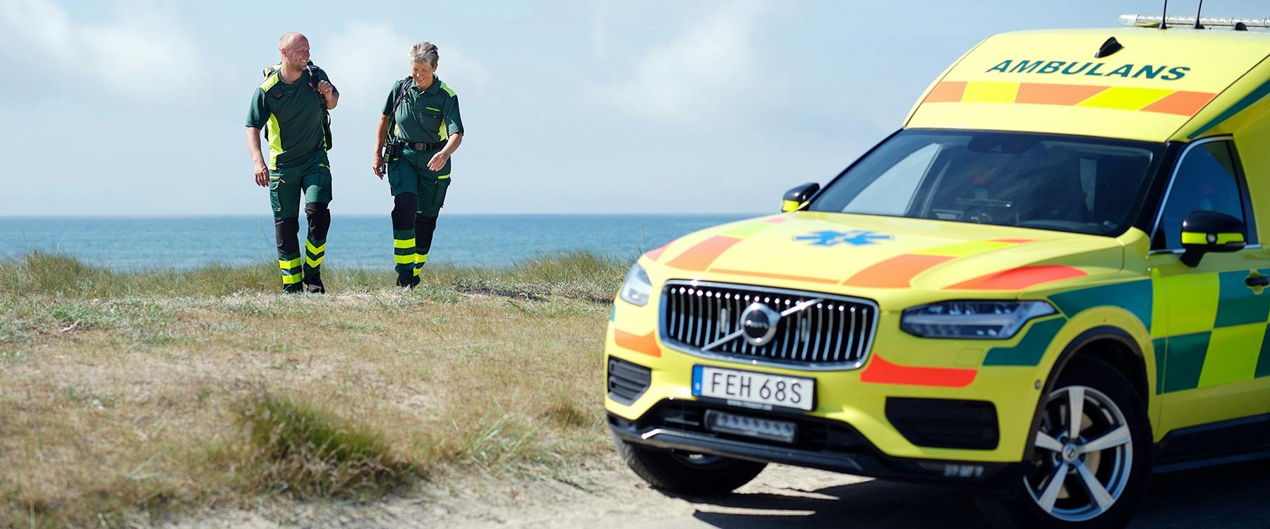 Ambulance staff by ambulance on the seaside